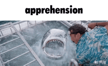 a man is looking at a shark in a cage and the word apprehendion is above it