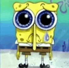 spongebob is crying with a tear coming out of his nose