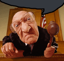 a judge with a speech bubble above his head holds a wooden gavel