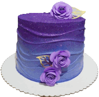 a purple cake with purple roses and gold leaves