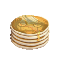 a stack of pancakes with syrup and a face on them