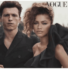 a man and a woman on the cover of a magazine called vogue