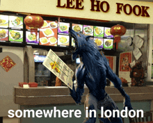 a werewolf holding a menu in front of lee ho fook