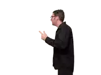 a man wearing glasses and a black shirt points to the right