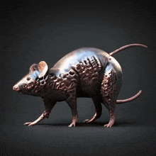 a statue of a rat with a long tail on a dark background