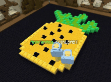 a screenshot of a minecraft game showing a pineapple with a green leaf on it .