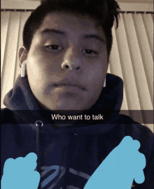 a man wearing a blue hoodie has a caption that says " who want to talk " on it