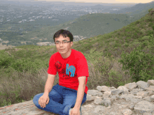 a man wearing a red shirt that has the number 19 on it