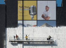 three men are painting a large billboard that says " tech your business "