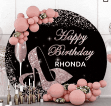 a happy birthday rhonda sign is surrounded by pink balloons