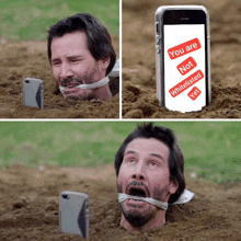 a man is buried in the dirt with a cell phone that says you are not whitelisted yet on it