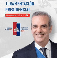 a man in a suit and tie is smiling in front of a banner that says juramentacion presidencial 2024