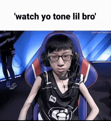 a man wearing headphones and glasses says ' watch yo tone lil bro ' on the bottom