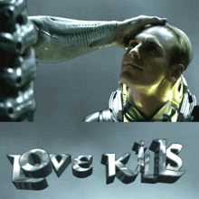 a man 's head is being touched by a robot and the words love kills are displayed below him