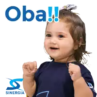 a little girl wearing a blue shirt with the word obama written on it