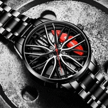 a black and white watch with a red brake caliper on it