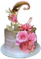 a cake with pink flowers and a gold letter c