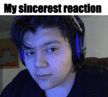 a man wearing headphones with the words " my sincerest reaction " above him