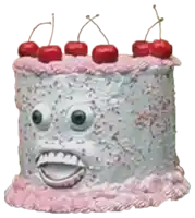 a cake with a face on it with cherries on top