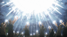 a crowd of people holding up their hands in front of a starry sky