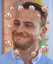 a man with a beard is smiling with clown faces on his face