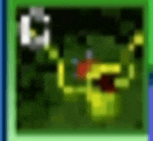 a blurred image of a green screen with a yellow object in the middle of it .