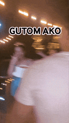 a blurry picture of a person with the words gutom ako written above them