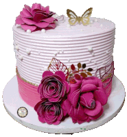 a pink and white cake with pink flowers and a butterfly