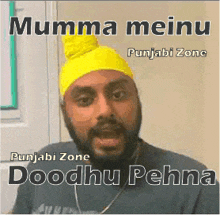 a man wearing a yellow turban with the words mumma meinu punjabi zone doodhu pehna on the bottom