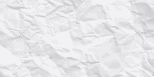 a close up of a white crumpled paper texture .