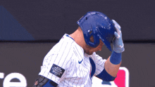 a baseball player has a patch on his arm that says mlb world series