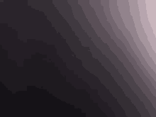 a black background with a white gradient in the middle of it .