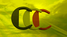 a green red and black cc logo with a yellow sky in the background