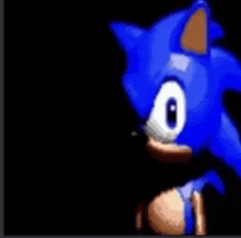 a close up of a blue sonic the hedgehog in a black background