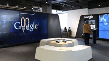 a google sign is displayed on a wall in a room