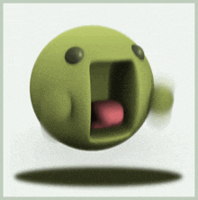 a green smiley face with its mouth open and a red tongue sticking out