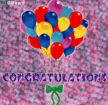 a bunch of colorful balloons with the words congratulations written above them