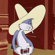 bugs bunny wearing a cowboy hat and smoking a cigarette .