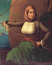 a painting of a woman in a green skirt holding a sword and pointing at something .