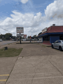 a car is parked in front of a restaurant that says no mexico unido