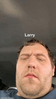 a man with the name larry written on his face