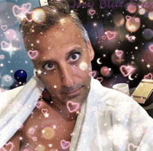 a man in a bathrobe is surrounded by hearts and stars