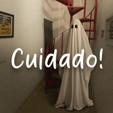 a picture of a ghost with the words cuidado in the corner