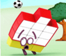 a red and yellow cube with a soccer ball flying in the air .