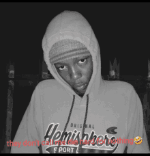 a man wearing a hoodie that says hemispher sport