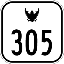 a sign with the number 305 and a bird on top