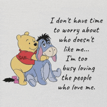 a poster of winnie the pooh and eeyore hugging with a quote about loving the people who love me