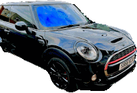 a black mini cooper with a license plate that says sb66kz