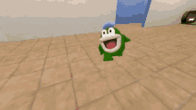 a green frog with a blue hat is standing on a tile floor