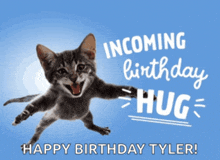 a cat is jumping in the air with the words incoming birthday hug